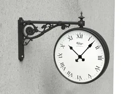 orologio artistico a sospensione ghisa e acciaio per mensola